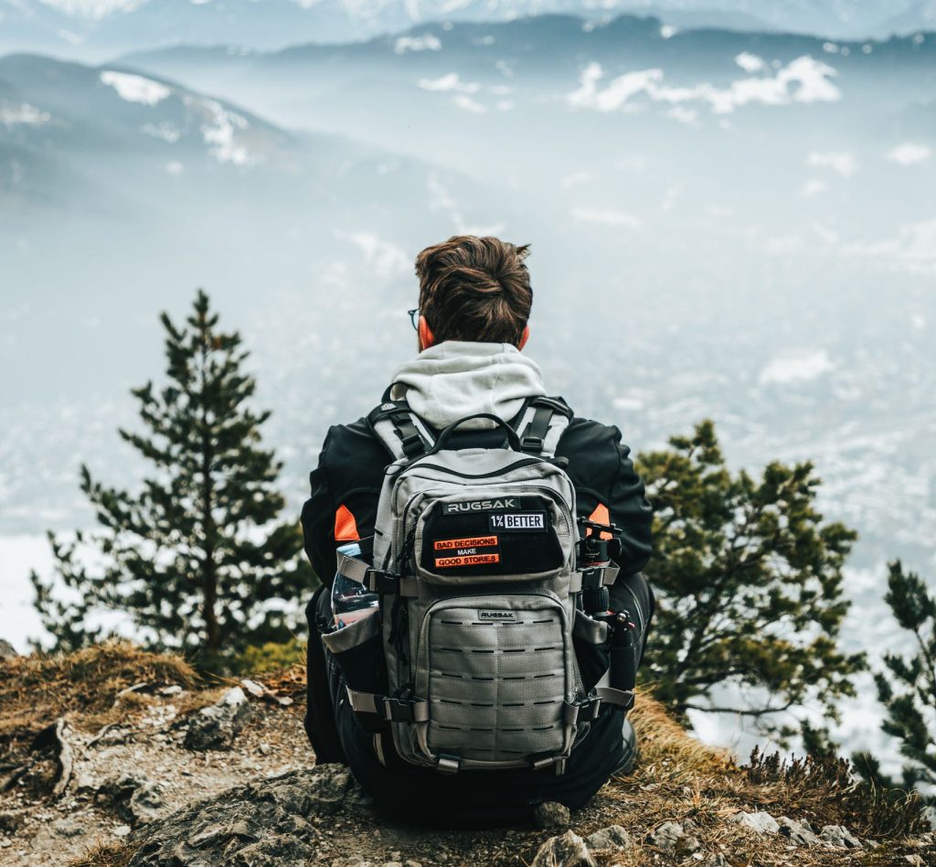 man wearing a traditional rucking backpack